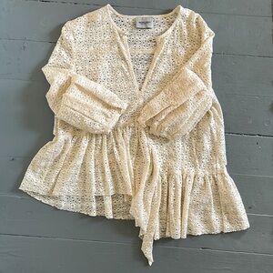 Rachel Comey lace shirt with asymmetrical pleated hem and full sleeves.